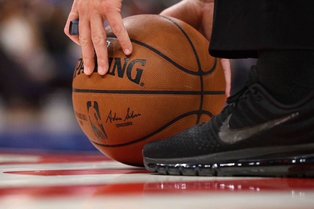 Dec 26, 2019; Detroit, Michigan, USA; A detail view of the basketball as a referee picks up during the game between the Detroit Pistons and the Washington Wizards at Little Caesars Arena.