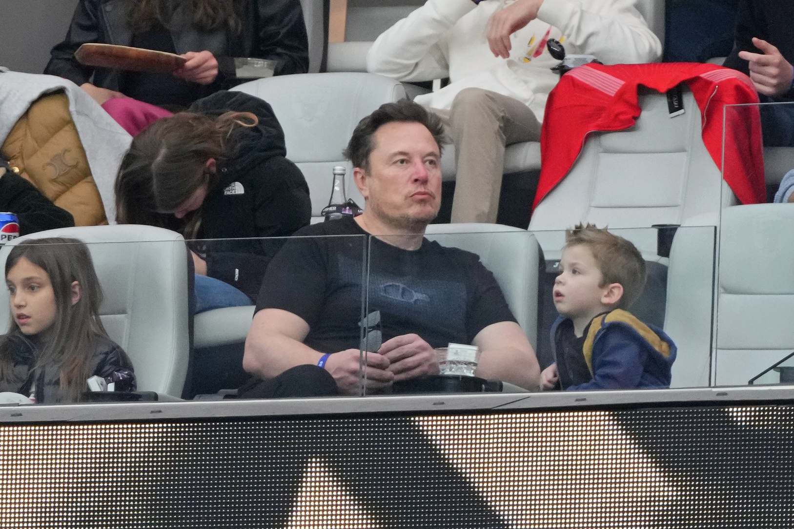 Feb 11, 2024; Paradise, Nevada, USA; Elon Musk looks on before Super Bowl LVIII between the San Francisco 49ers and the Kansas City Chiefs at Allegiant Stadium.