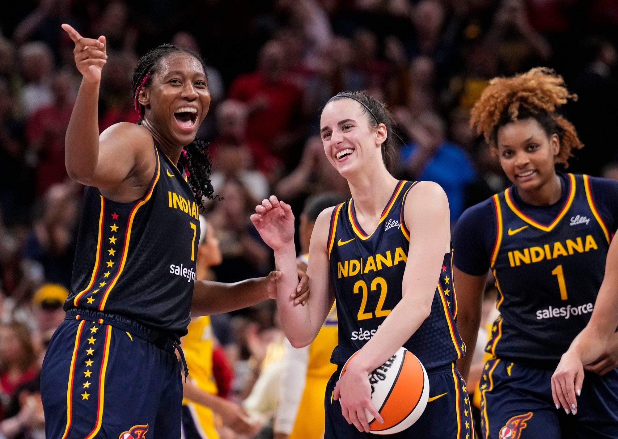 Indiana Fever forward Aliyah Boston (7) celebrates with Indiana Fever guard Caitlin Clark (22) altering recording a triple-double Wednesday, Sept. 4, 2024, during the game at Gainbridge Fieldhouse in Indianapolis. The Indiana Fever defeated the Los Angeles Sparks, 93-86.