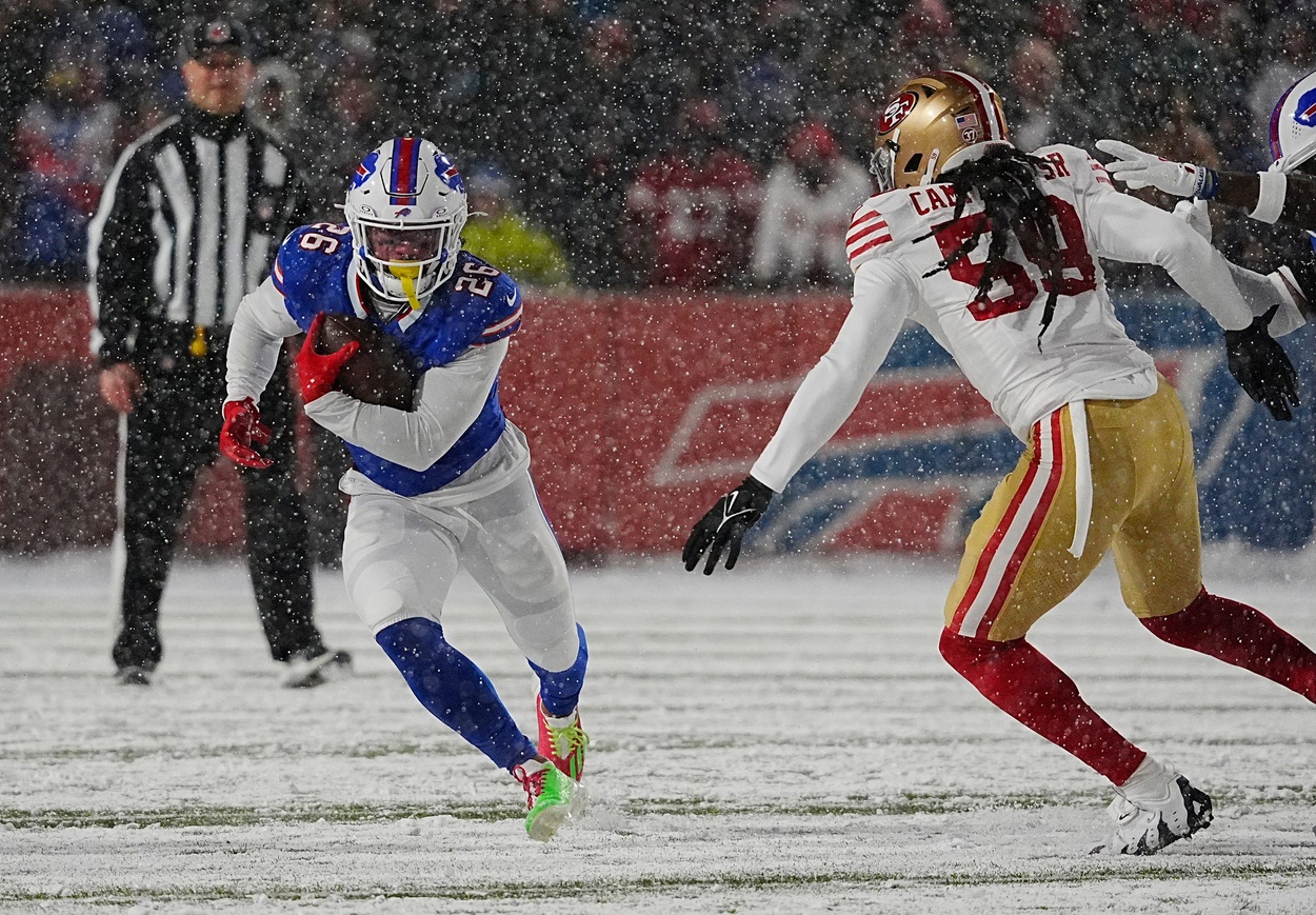 Bills Ty Johnson tries to avoid 49ers De'Vondre Campbell Sr. unsuccessfully on the carry during first half action of their home game against the San Francisco 49ers in Orchard Park on Dec. 1, 2024.