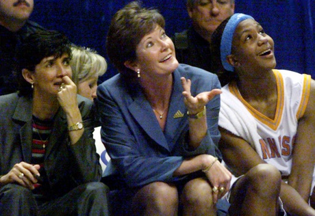 Tennessee assistant coach Mickie DeMoss, left, coach Pat Summitt and player Tamika Catchings smile as they watch the clock tick down in the Lady Vols 77-56 NCAA Mideast Regional semifinal at The Pyramid in Memphis on March 25, 2000.