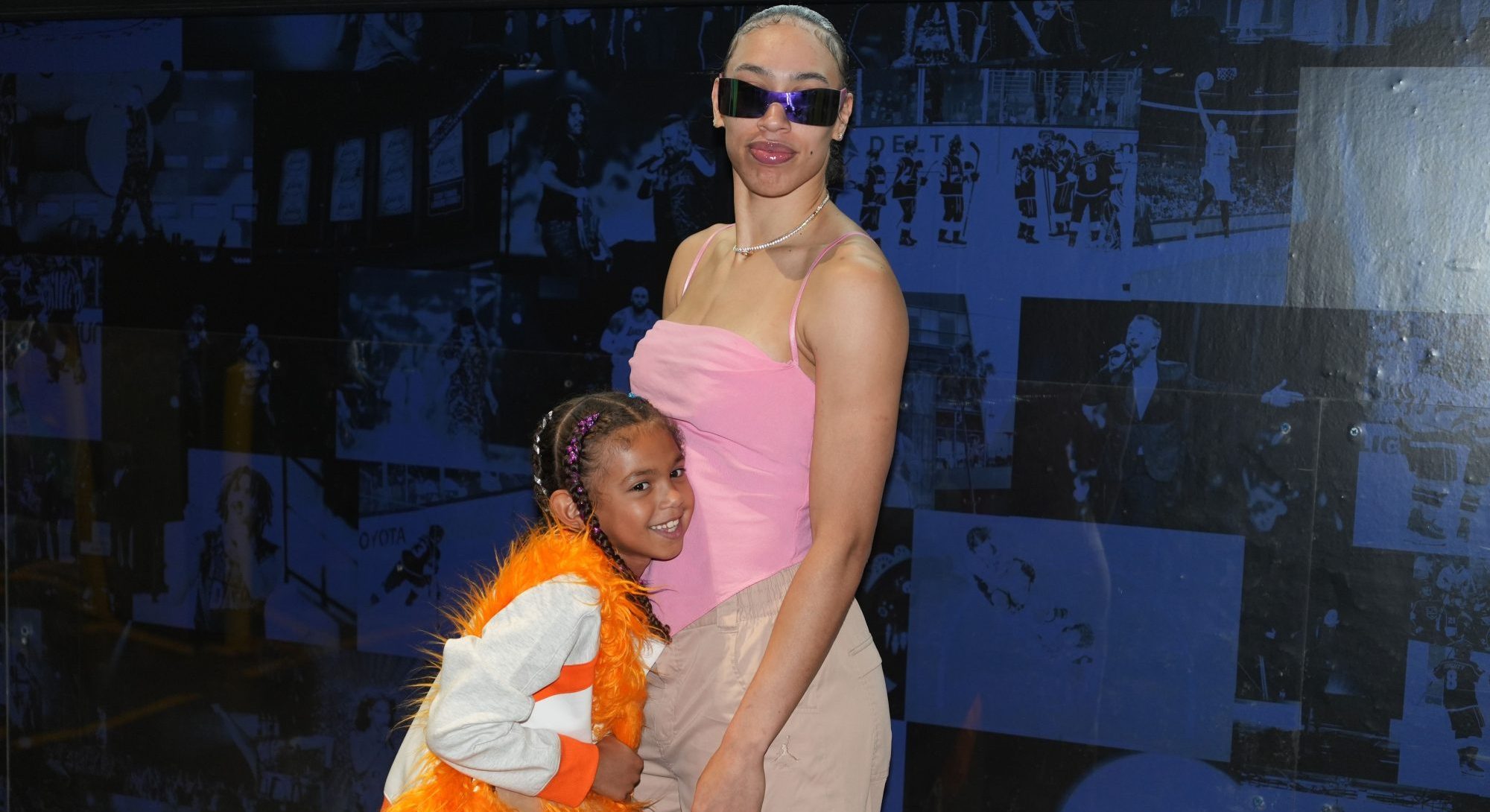 Sep 10, 2024; Los Angeles, California, USA; LA Sparks forward Dearica Hamby poses with daughter Amaya before the game against the Connecticut Sun at Crypto.com Arena