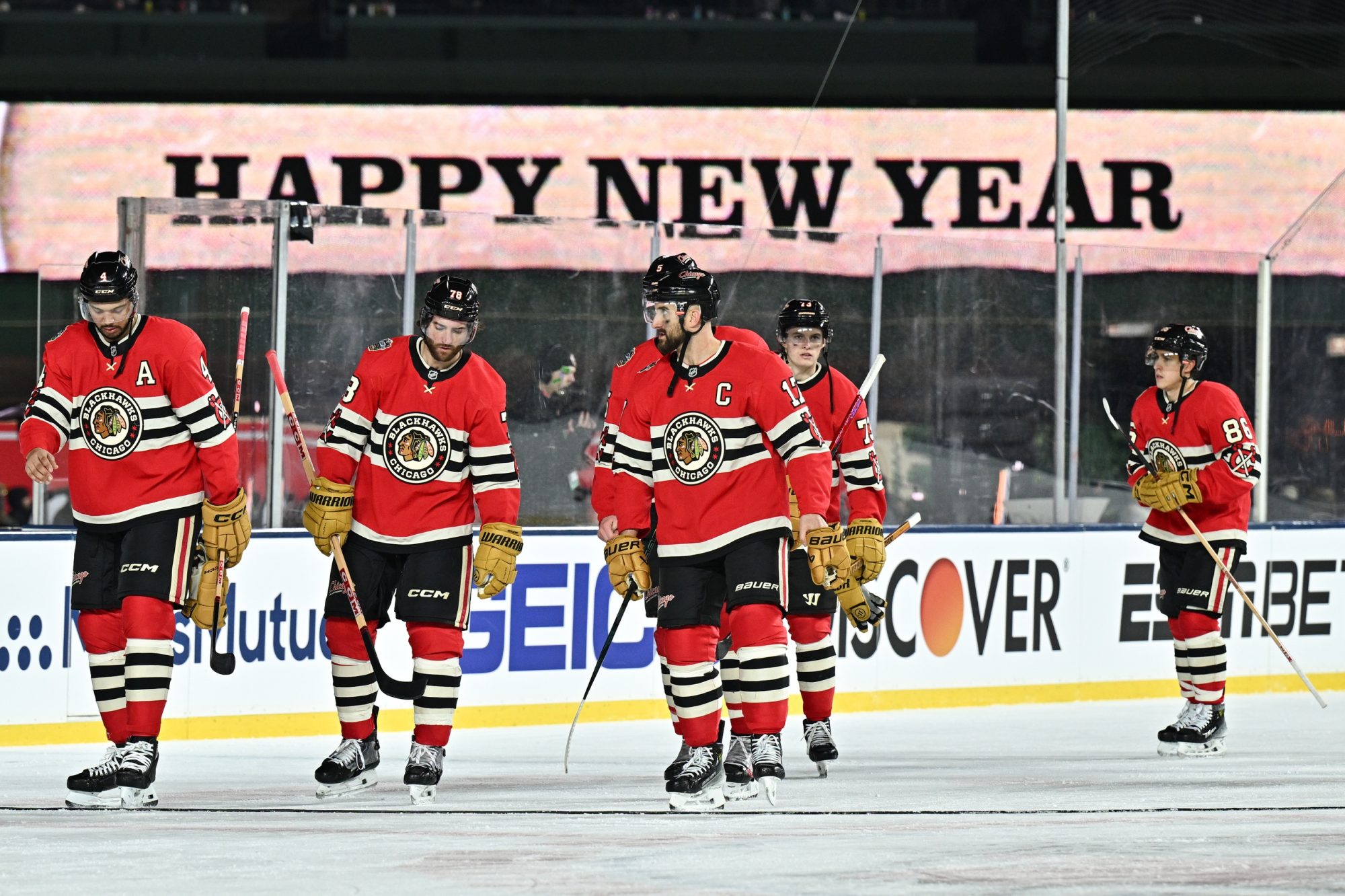 Dec 31, 2024; Chicago, Illinois, USA; The Chicago Blackhawks look on after the Winter Classic against the St. Louis Blues at Wrigley Field.