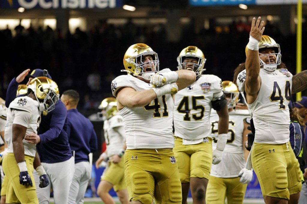 Jan 2, 2025; New Orleans, LA, USA;  Notre Dame Fighting Irish defensive lineman Donovan Hinish (41) celebrates after a play against Georgia Bulldogs at Caesars Superdome.