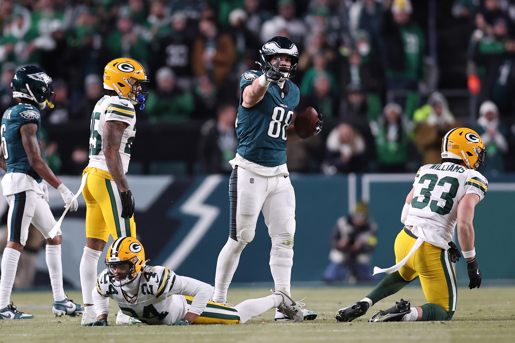 Jan 12, 2025; Philadelphia, Pennsylvania, USA; Philadelphia Eagles tight end Dallas Goedert (88) reacts after making a catch against Green Bay Packers cornerback Carrington Valentine (24) in an NFC wild card game