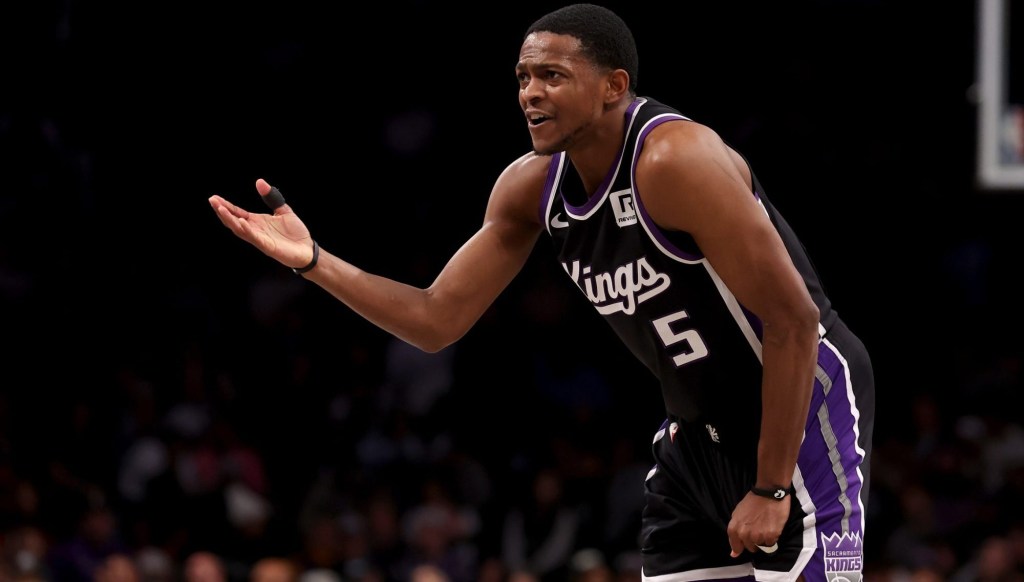 Jan 27, 2025; Brooklyn, New York, USA; Sacramento Kings guard De'Aaron Fox (5) reacts during the second quarter against the Brooklyn Nets at Barclays Center.