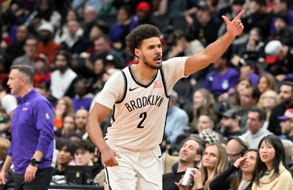 Dec 19, 2024; Toronto, Ontario, CAN; Brooklyn Nets forward Cam Johnson (2) reacts after making a three point basket against the Toronto Raptors in the second half at Scotiabank Arena.