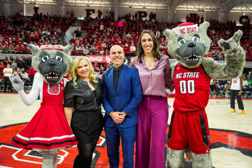 Raleigh, NC - February 23, 2025 - Reynolds Coliseum: NC State Wolfpack mascots Mr Wuf and Ms Wuf with Holly Rowe, Ryan Ruocco, and Rebecca Lobo on the set of College GameDay Covered by State Farm at North Carolina State University (NC State).