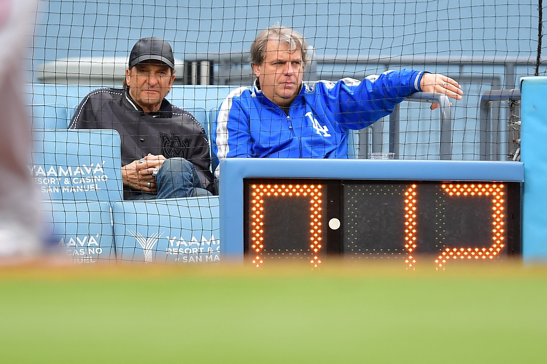 May 31, 2023; Los Angeles, California, USA; Los Angeles Dodgers ownership Peter Guber and Todd Boehly watch game action against the Washington Nationals at Dodger Stadium.