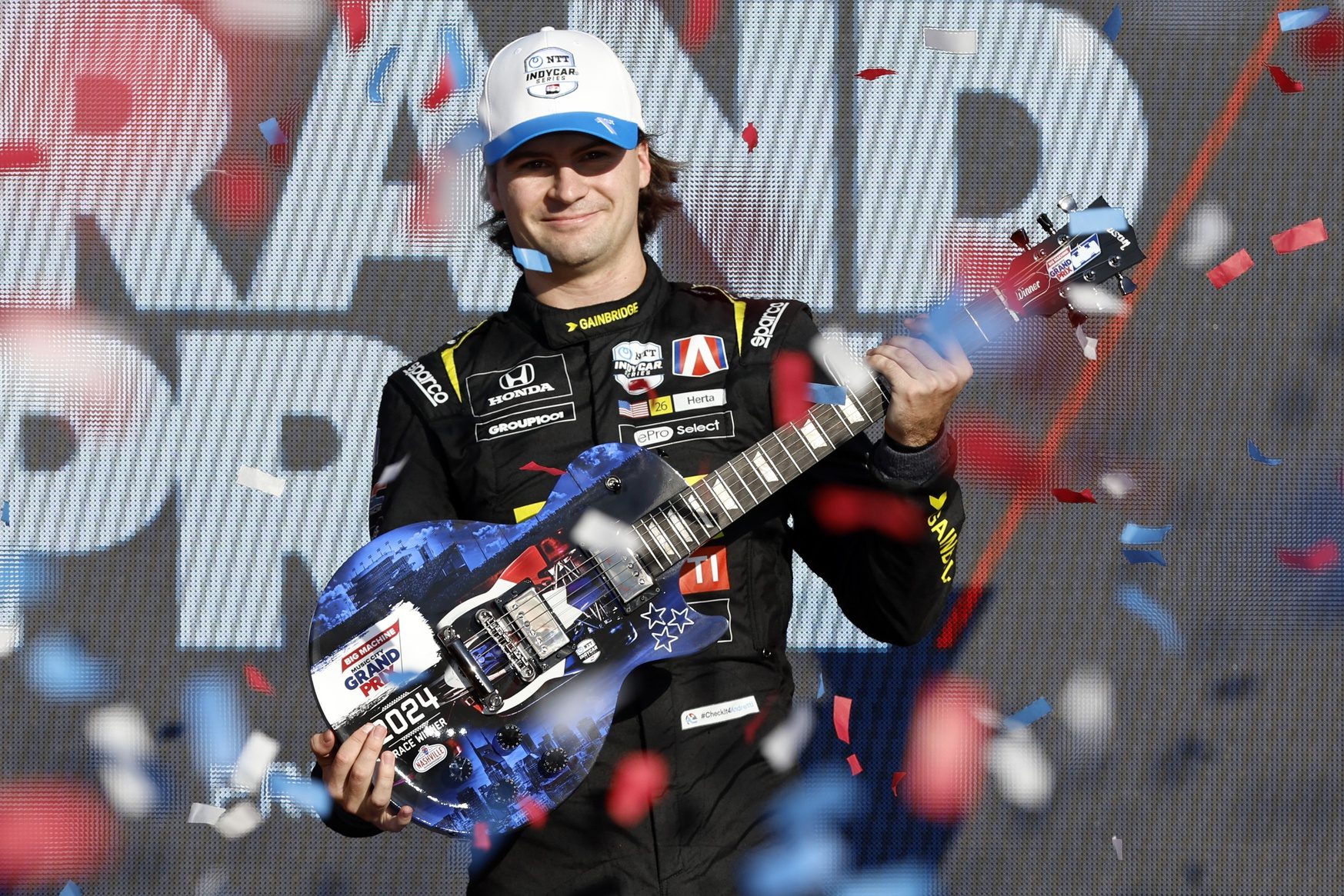 Sep 15, 2024; Nashville, Tennessee, USA; Andretti Autosport with Curb-Agajanian driver Colton Herta (26) of United States celebrates after winning the Big Machine Music City Gran Prix at Nashville Superspeedway.