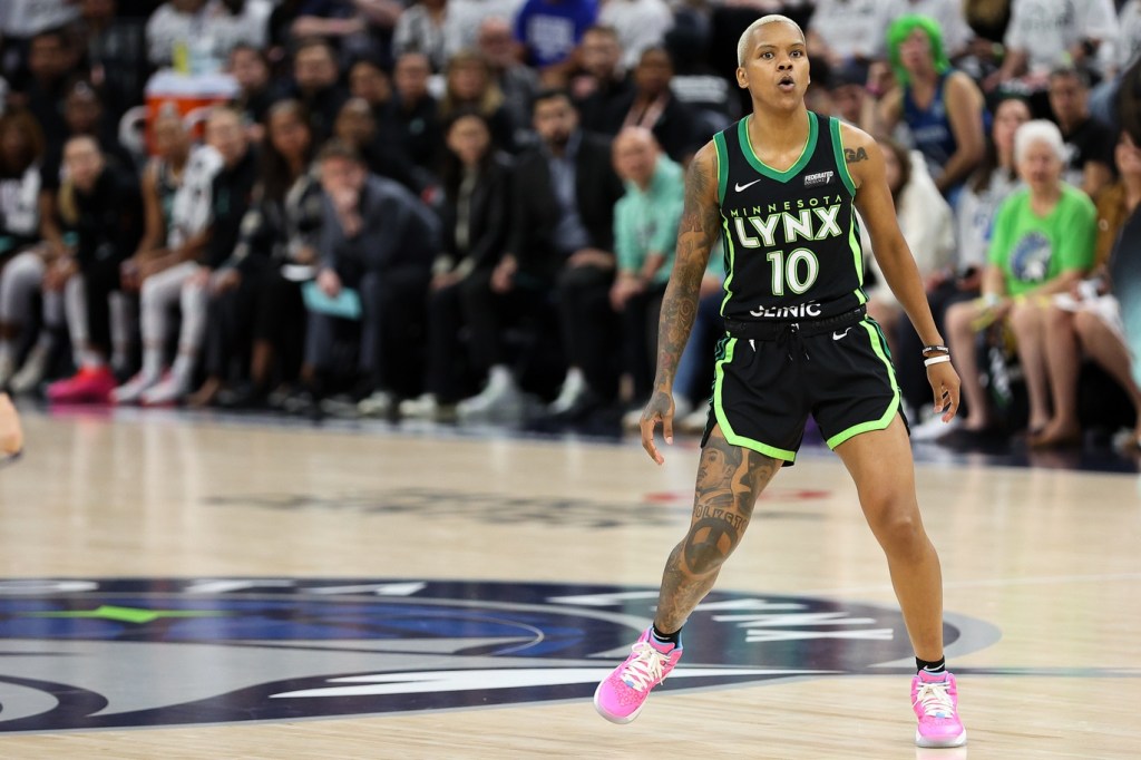 Oct 18, 2024; Minneapolis, Minnesota, USA; Minnesota Lynx guard Courtney Williams (10) reacts to her shot against the New York Liberty during the first half of game four of the 2024 WNBA Finals at Target Center