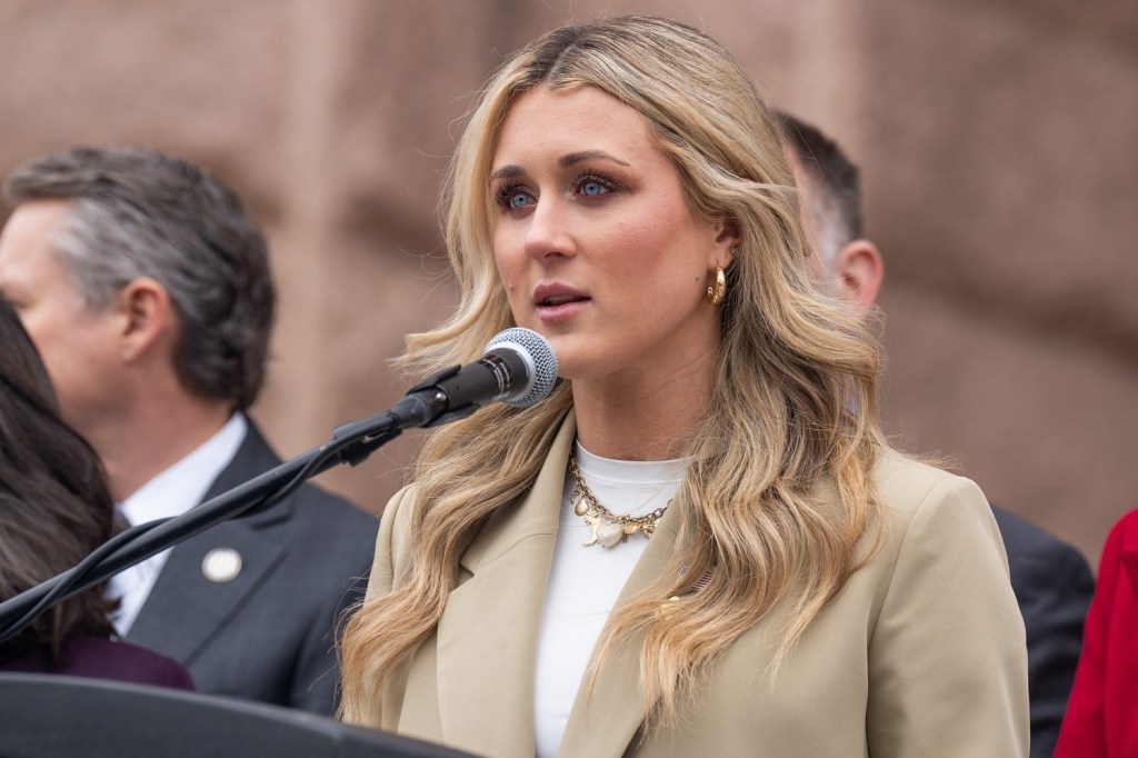 Riley Gaines, a conservative political activist and swimmer, speaks during a press conference calling for support of school vouchers outside the Texas Capitol Thursday, Feb. 20, 2025.