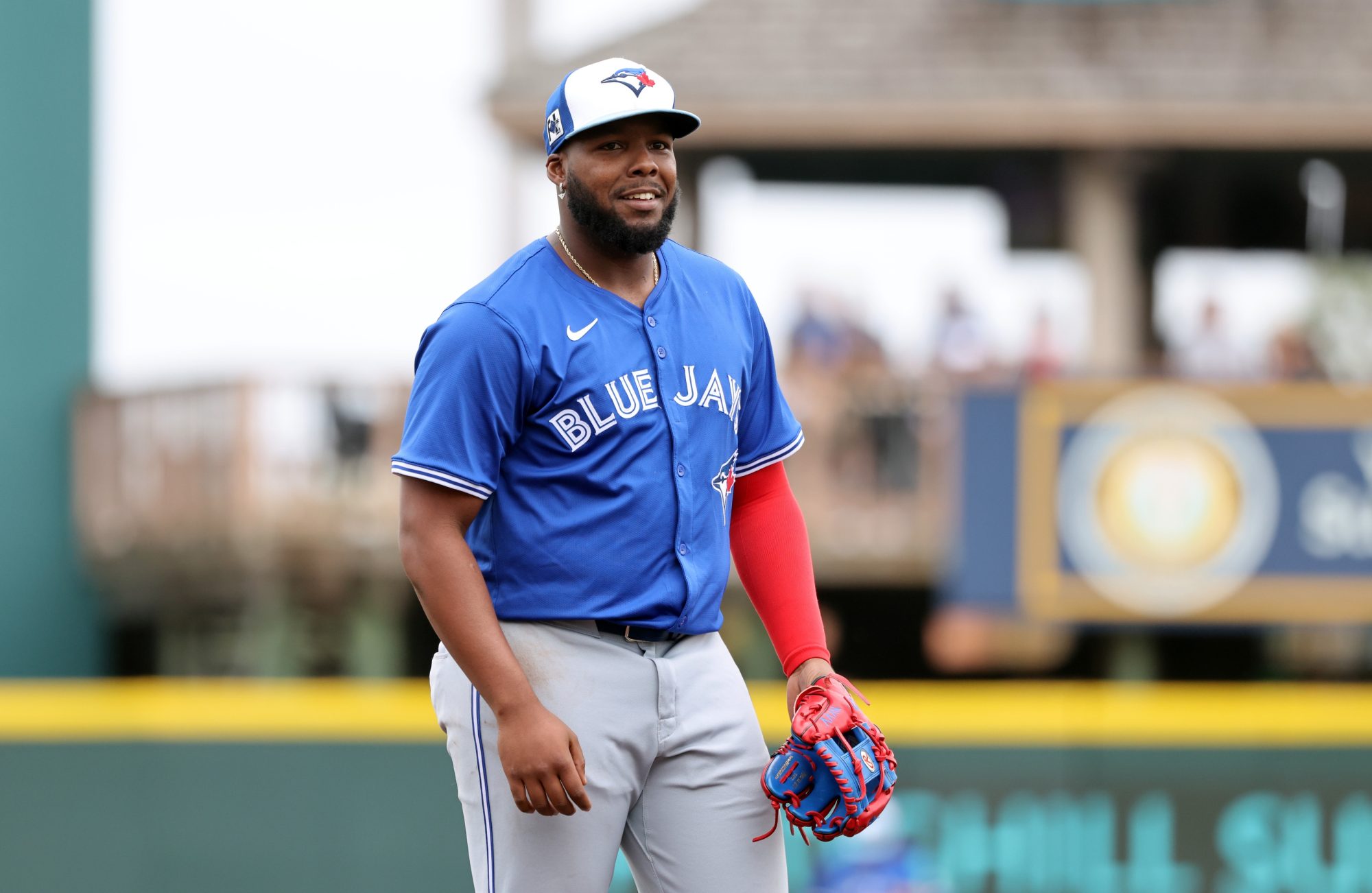 Mar 5, 2025; Bradenton, Florida, USA; Toronto Blue Jays infielder Vladimir Guerrero Jr. (27) looks on against the Pittsburgh Pirates at LECOM Park.