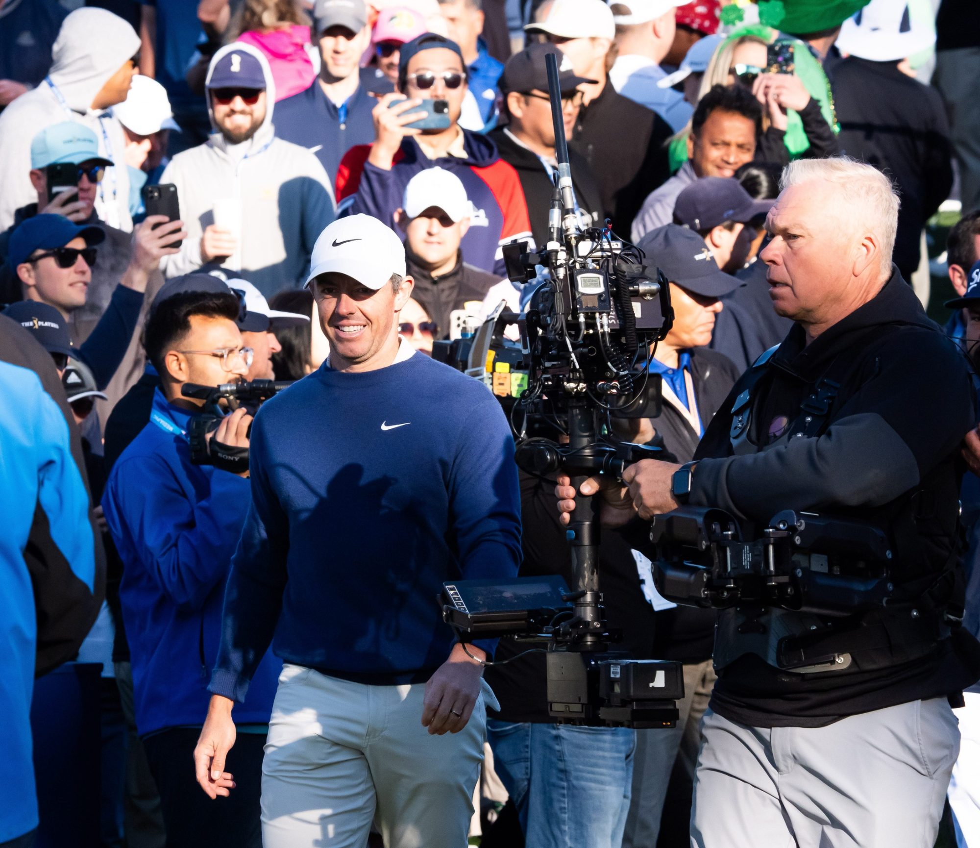 Rory McIlroy arrives on the tee box on the 16th hole to compete in a three-hole aggregate playoff of the Players Championship at TPC Sawgrass Monday March 17, 2025 in Ponte Vedra Beach, Fl. McIlroy won his second Players Championship at +1 over J.J. Spaun.