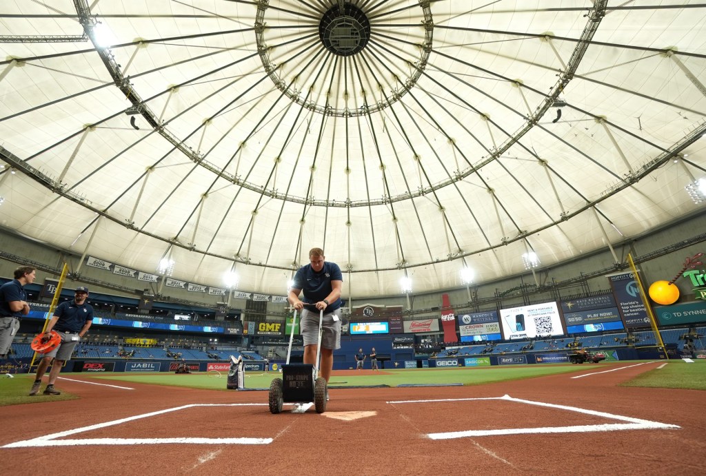 Aug 13, 2022; St. Petersburg, Florida, USA; Tropicana Field grounds crew prepares the field for todayÕs game where the Tampa Bay Rays host the Baltimore Orioles at Tropicana Field.