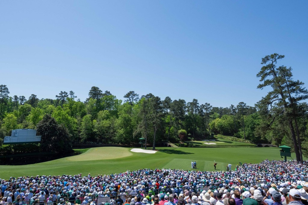 Apr 14, 2024; Augusta, Georgia, USA; Tiger Woods hits his tee shot on the 12th hole during the final round of the Masters Tournament.