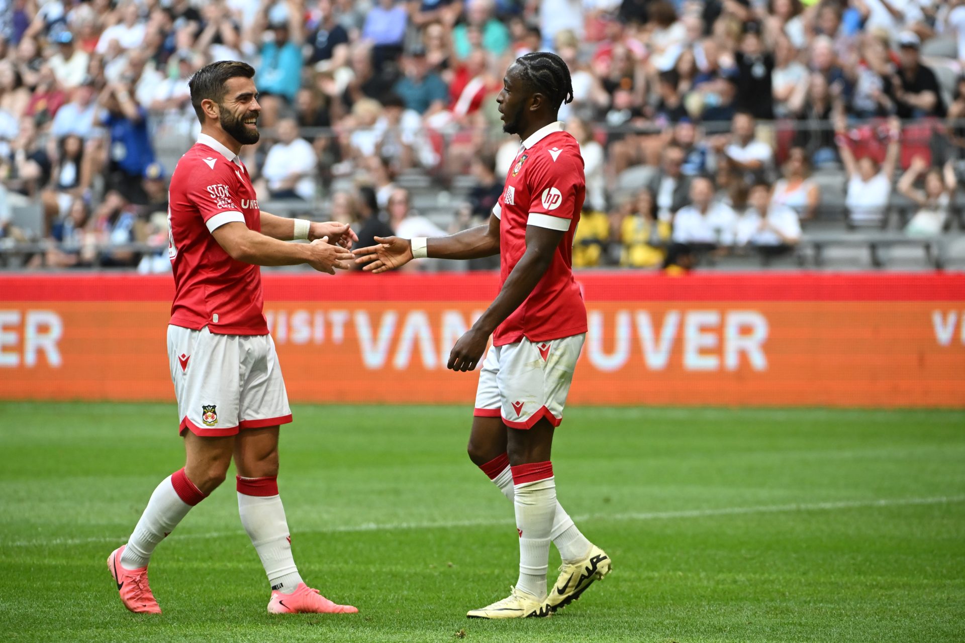 Jul 27, 2024; Vancouver, British Columbia, CAN; Wrexham AFC midfielder Sebastian Revan (53) celebrates scoring against Vancouver Whitecaps FC during the first half at BC Place.