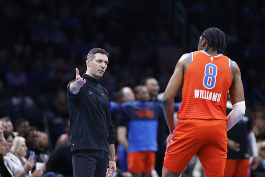 Dec 3, 2024; Oklahoma City, Oklahoma, USA; Oklahoma City Thunder head coach Mark Daigneault talks to forward Jalen Williams (8) between plays against the Utah Jazz during the second half of an NBA Cup game at Paycom Center.