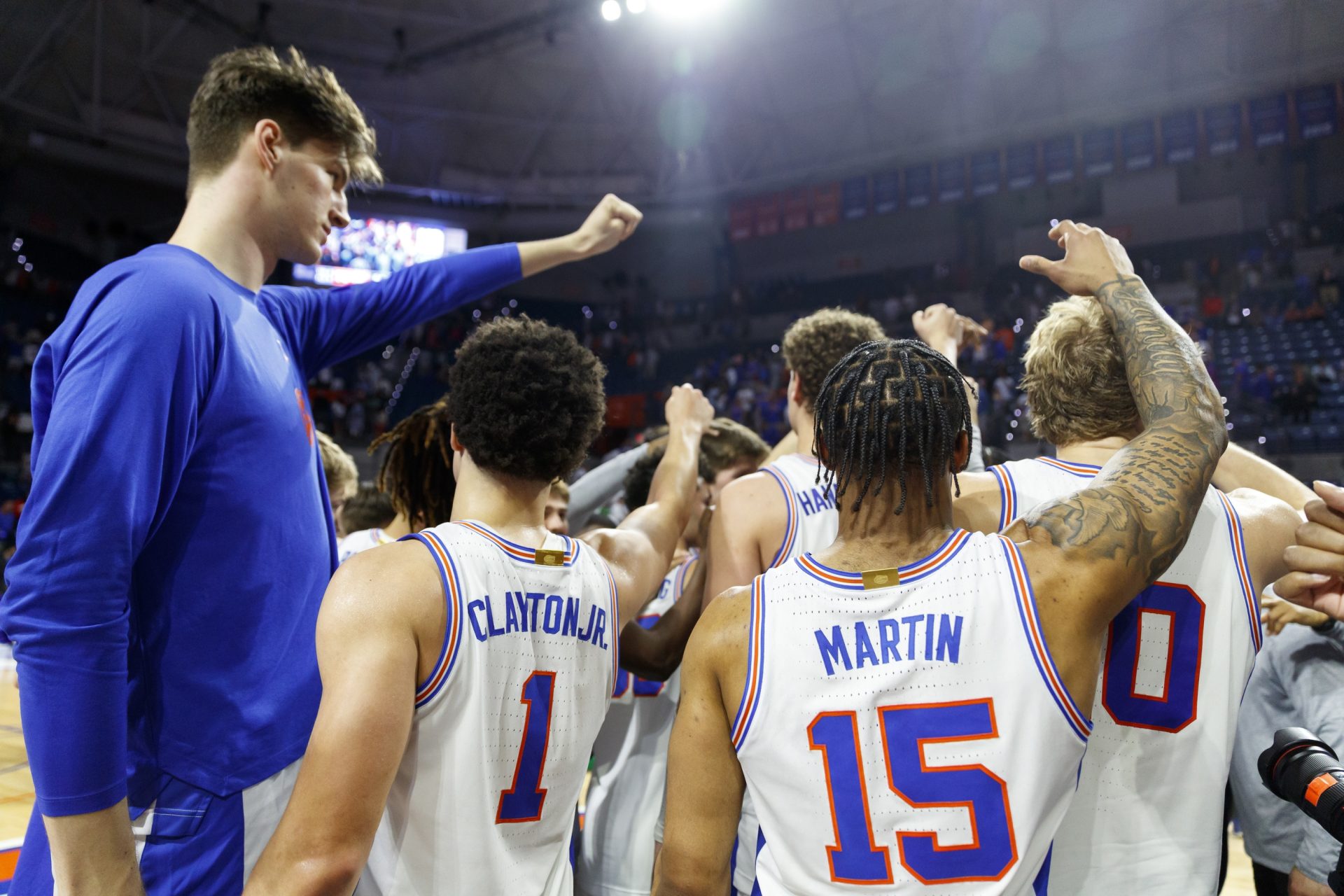Mar 1, 2025; Gainesville, Florida, USA; Florida Gators guard Walter Clayton Jr. (1) and center Olivier Rioux (32) and guard Alijah Martin (15) and forward Thomas Haugh (10) huddle after the game against the Texas A&M Aggies at Exactech Arena at the Stephen C. O'Connell Center