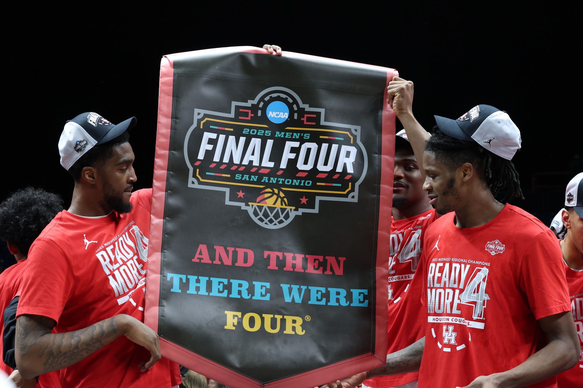 Mar 30, 2025; Indianapolis, IN, USA; The Houston Cougars react on the stage after defeating the Tennessee Volunteers during the Midwest Regional final of the 2025 NCAA tournament at Lucas Oil Stadium.