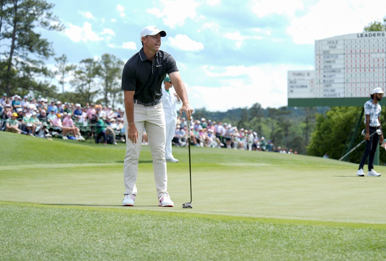 Apr 11, 2025; Augusta, Georgia, USA; Rory McIlroy reacts after missing a putt on no. 18 during the second round of the Masters Tournament at Augusta National Golf Club.