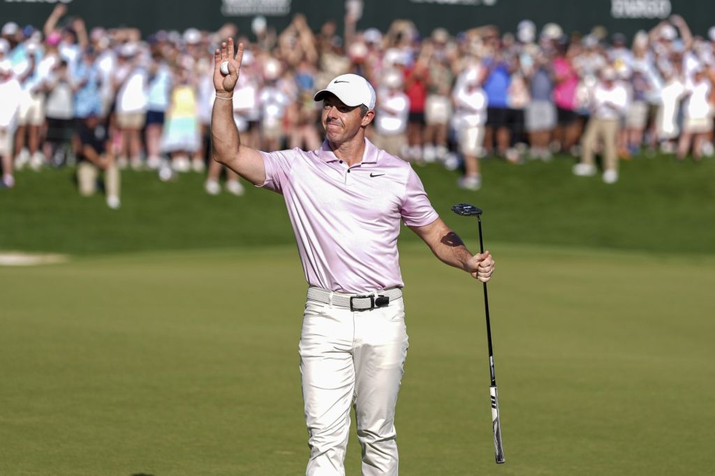May 12, 2024; Charlotte, North Carolina, USA; Rory McIlroy acknowledges the gallery after his final putt and win during the final round of the Wells Fargo Championship golf tournament.