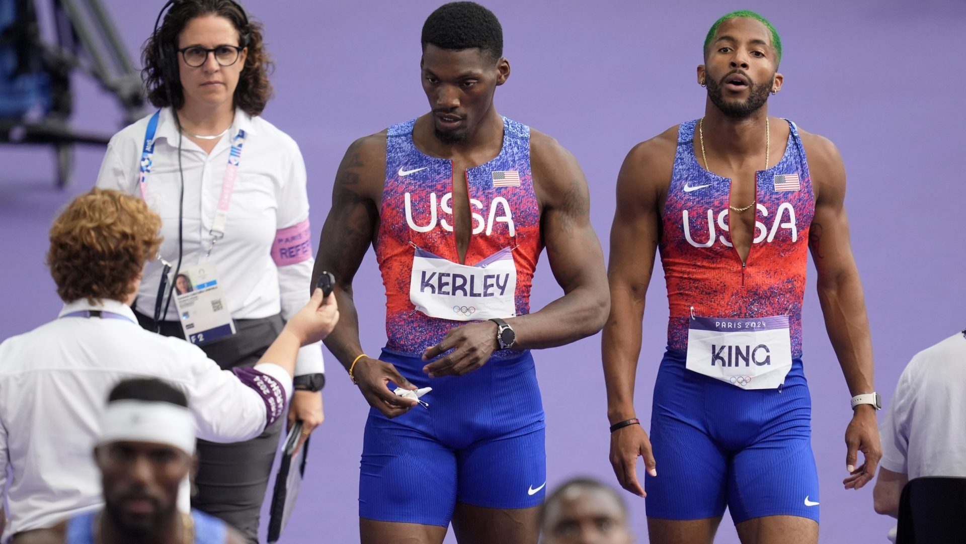 Aug 9, 2024; Paris Saint-Denis, France; Fred Kerley (USA) and Kyree King (USA) react after the mens 4x100m relay during the Paris 2024 Olympic Summer Games at Stade de France.