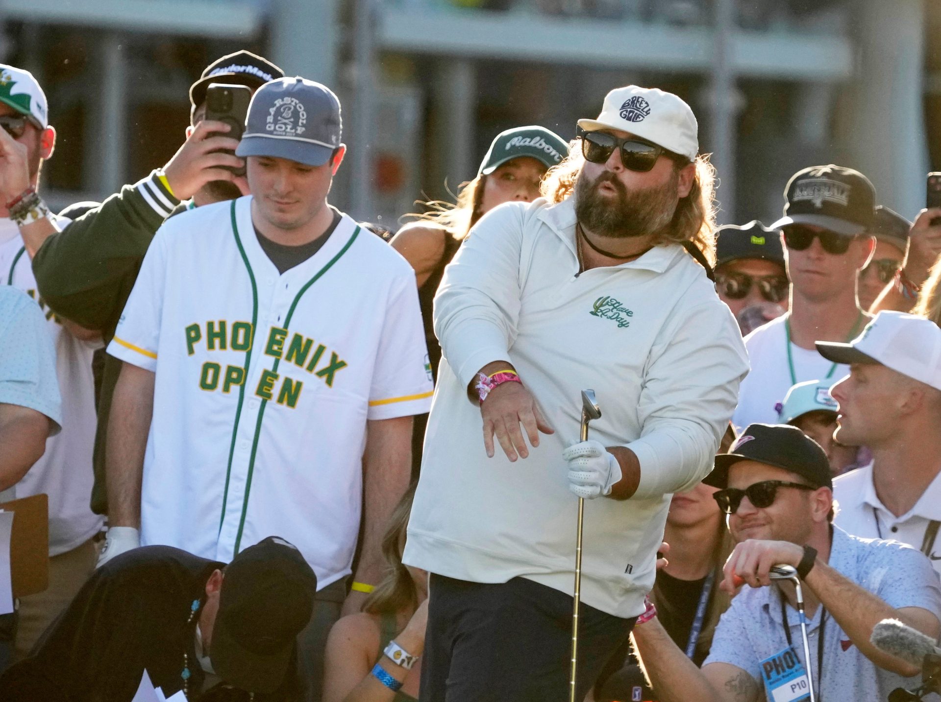 Fat Perez reacts after hitting his shot on the 16th tee during the WHOOP Shot at Glory on the 16th hole at TPC in Scottsdale on Feb. 5, 2025.
