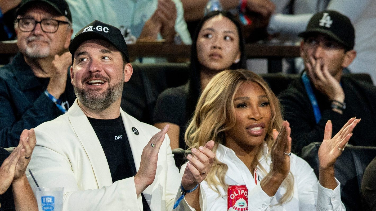 Los Angeles Golf Club owners Alexis Ohanian and Serena Williams cheer for their team against the New York Golf Club during the TGL semifinal match at SoFi Center on March 17, 2025, in Palm Beach Gardens, Florida.