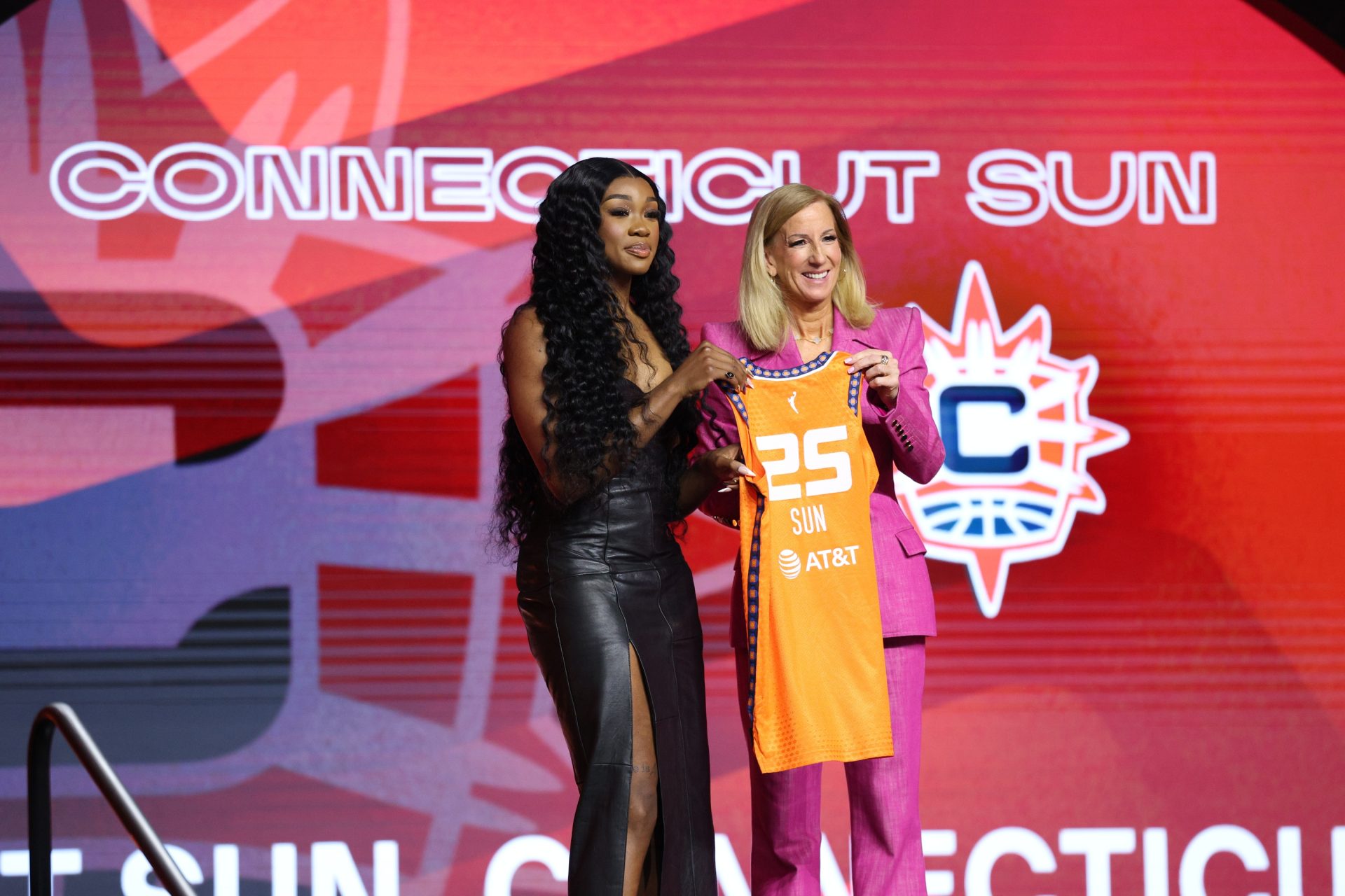 Apr 14, 2025; New York, New York, USA; Aneesah Morrow poses with WNBA commissioner Cathy Engelbert after being selected with the number seven overall pick to the Connecticut Sun in the 2025 WNBA Draft at The Shed at Hudson Yards.
