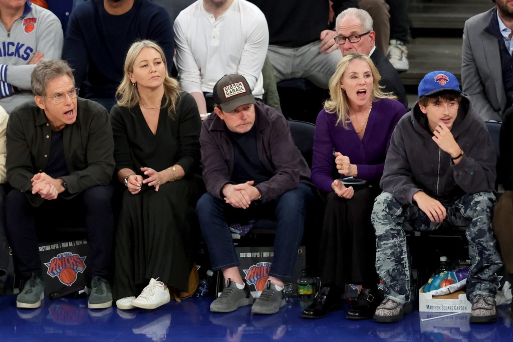 Apr 21, 2025; New York, New York, USA; American actors Ben Stiller (left to right) and Christine Taylor sit courtside next to Canadian-American actor and activist Michael J. Fox and his wife Tracy Pollan and French-American actor Timothee Chalamet during the fourth quarter of game two of the first round of the 2024 NBA Playoffs between the New York Knicks and the Detroit Pistons at Madison Square Garden.