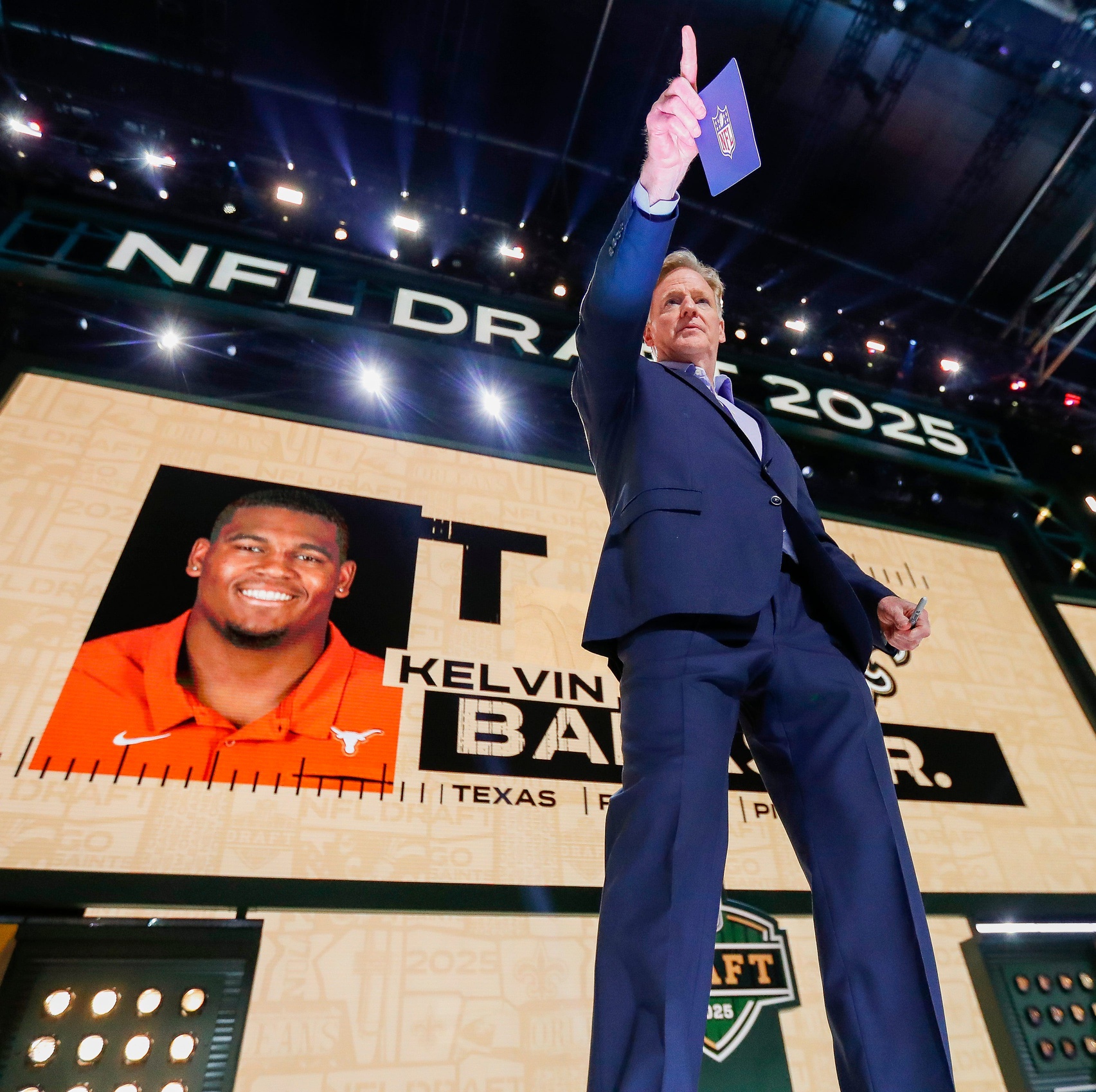 NFL Commissioner Roger Goodell points to a fan in the crowd during the first round of the 2025 NFL Draft on Thursday, April 24, 2025, at Lambeau Field in Green Bay, Wisconsin. The draft runs through April 26.