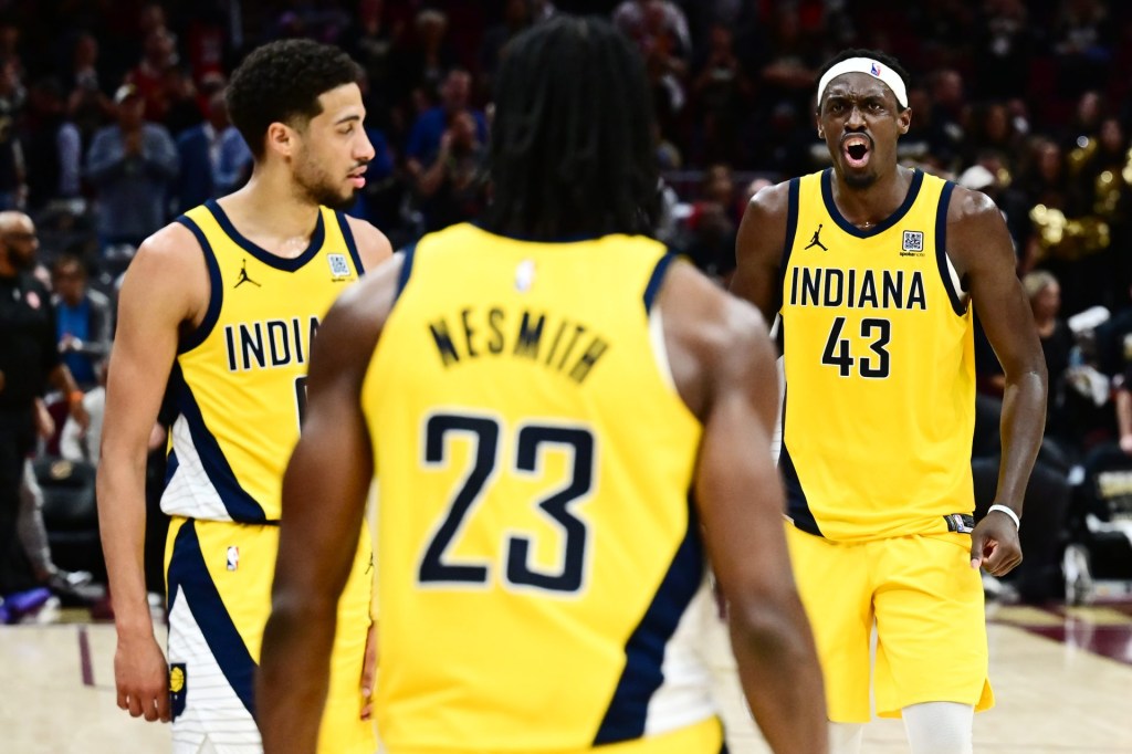May 13, 2025; Cleveland, Ohio, USA; Indiana Pacers forward Aaron Nesmith (23) and guard Tyrese Haliburton (0) and forward Pascal Siakam (43) celebrate during the second half of game five against the Cleveland Cavaliers in the second round for the 2025 NBA Playoffs at Rocket Arena.