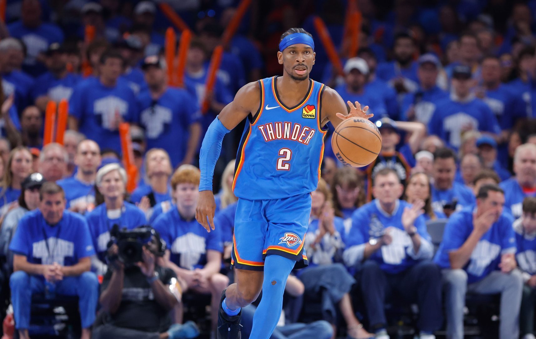 May 18, 2025; Oklahoma City, Oklahoma, USA; Oklahoma City Thunder guard Shai Gilgeous-Alexander (2) dribbles the ball down the court against the Denver Nuggets in the second half during game seven of the second round for the 2025 NBA Playoffs at Paycom Center.