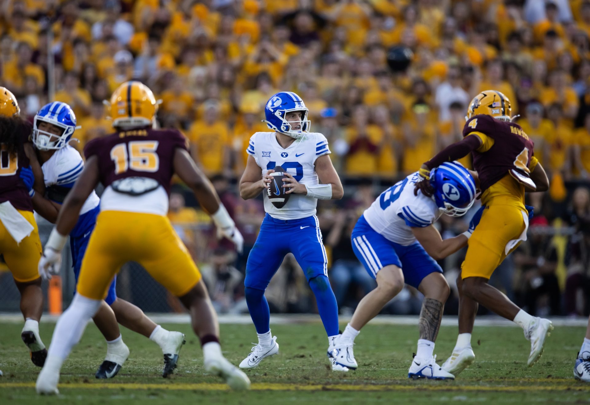 Nov 23, 2024; Tempe, Arizona, USA; Brigham Young Cougars quarterback Jake Retzlaff (12) against the Arizona State Sun Devils at Mountain America Stadium.