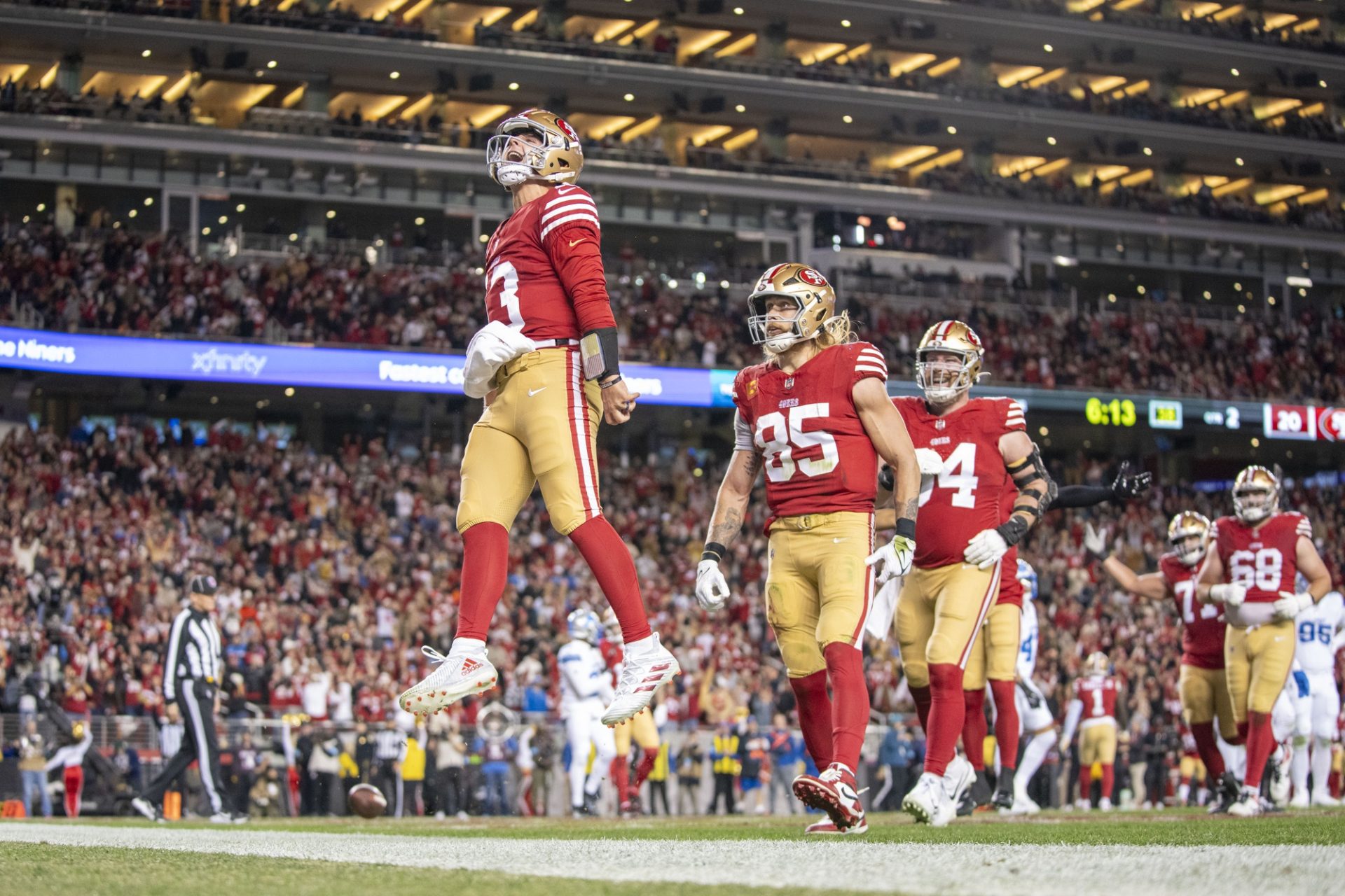 December 30, 2024; Santa Clara, California, USA; San Francisco 49ers quarterback Brock Purdy (13) celebrates after scoring a touchdown against the Detroit Lions during the second quarter at Levi's Stadium.