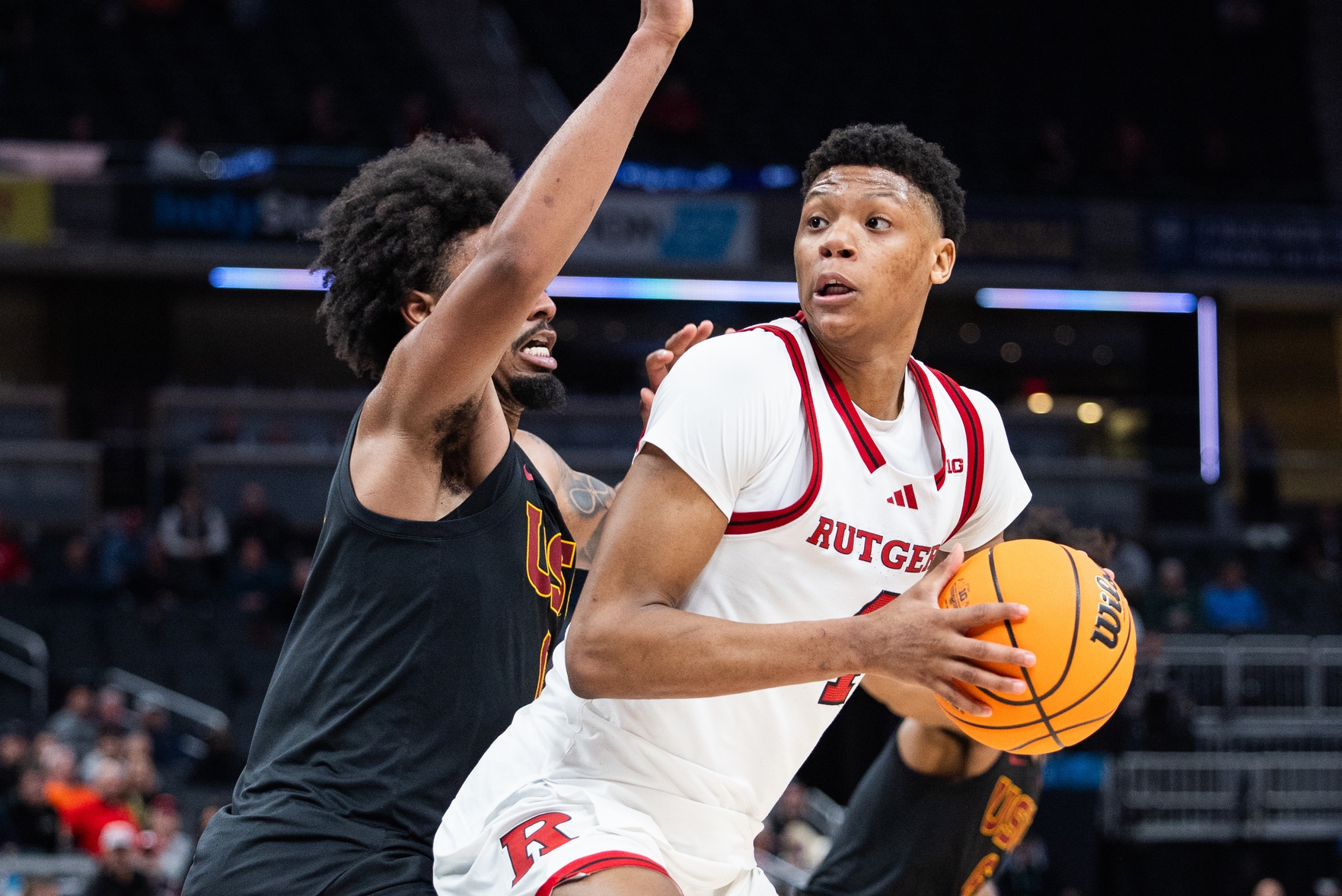 Mar 12, 2025; Indianapolis, IN, USA; Rutgers Scarlet Knights guard Ace Bailey (4) shoots the ball while USC Trojans guard Kevin Patton Jr. (8) defends in the second half at Gainbridge Fieldhouse.