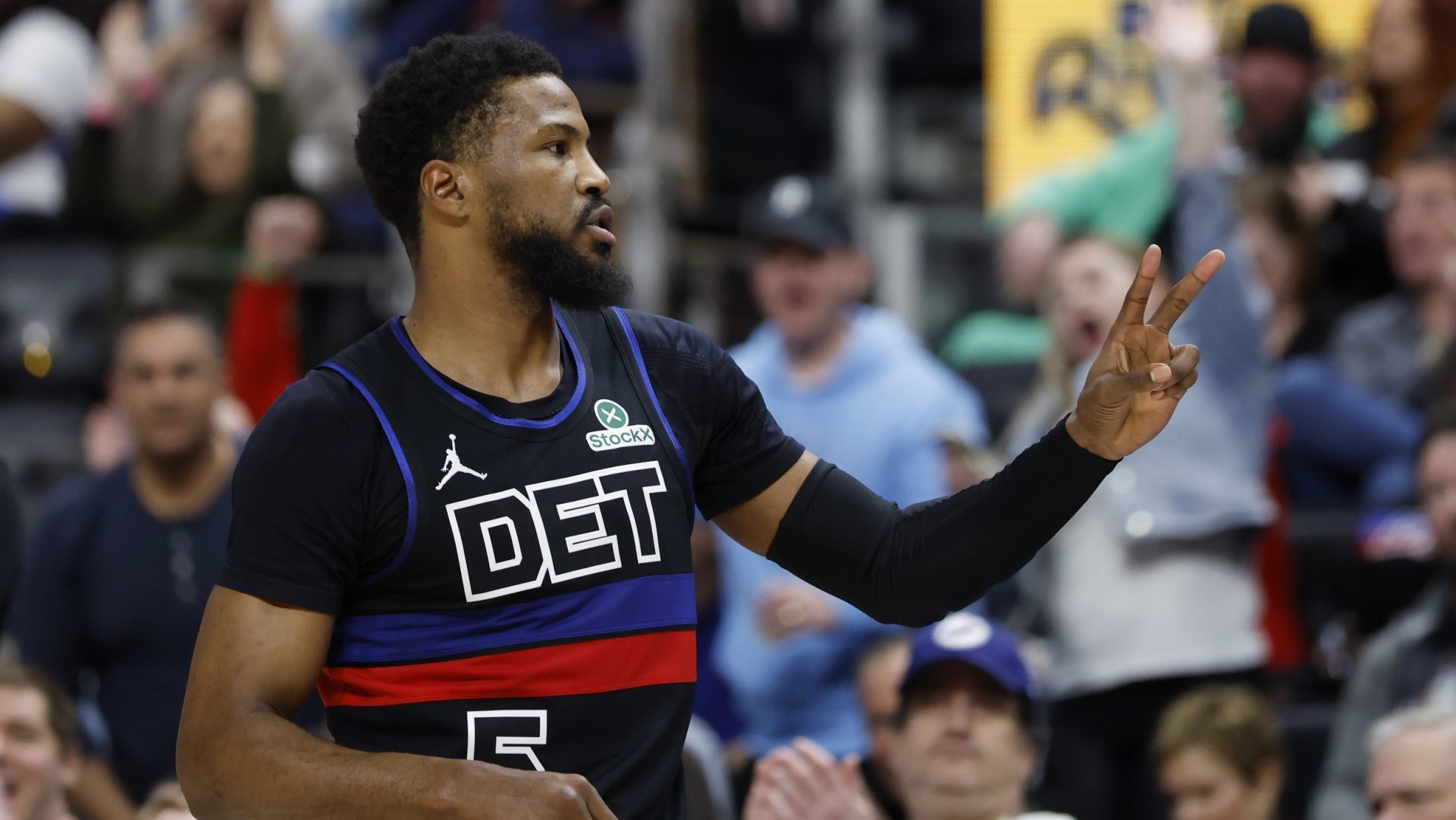 Mar 15, 2025; Detroit, Michigan, USA; Detroit Pistons guard Malik Beasley (5) celebrates in the first half against the Oklahoma City Thunder at Little Caesars Arena.