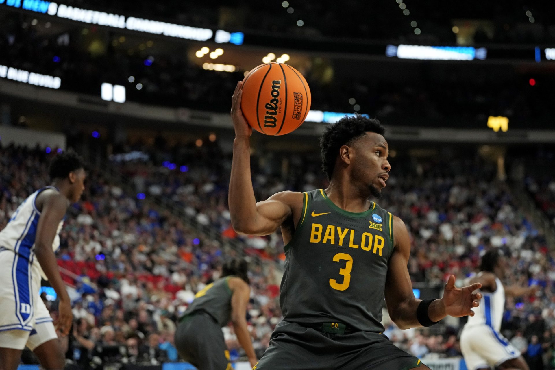 Mar 23, 2025; Raleigh, NC, USA; Baylor Bears guard Jeremy Roach (3) reacts after a play during the first half against the Duke Blue Devils in the second round of the NCAA Tournament at Lenovo Center.