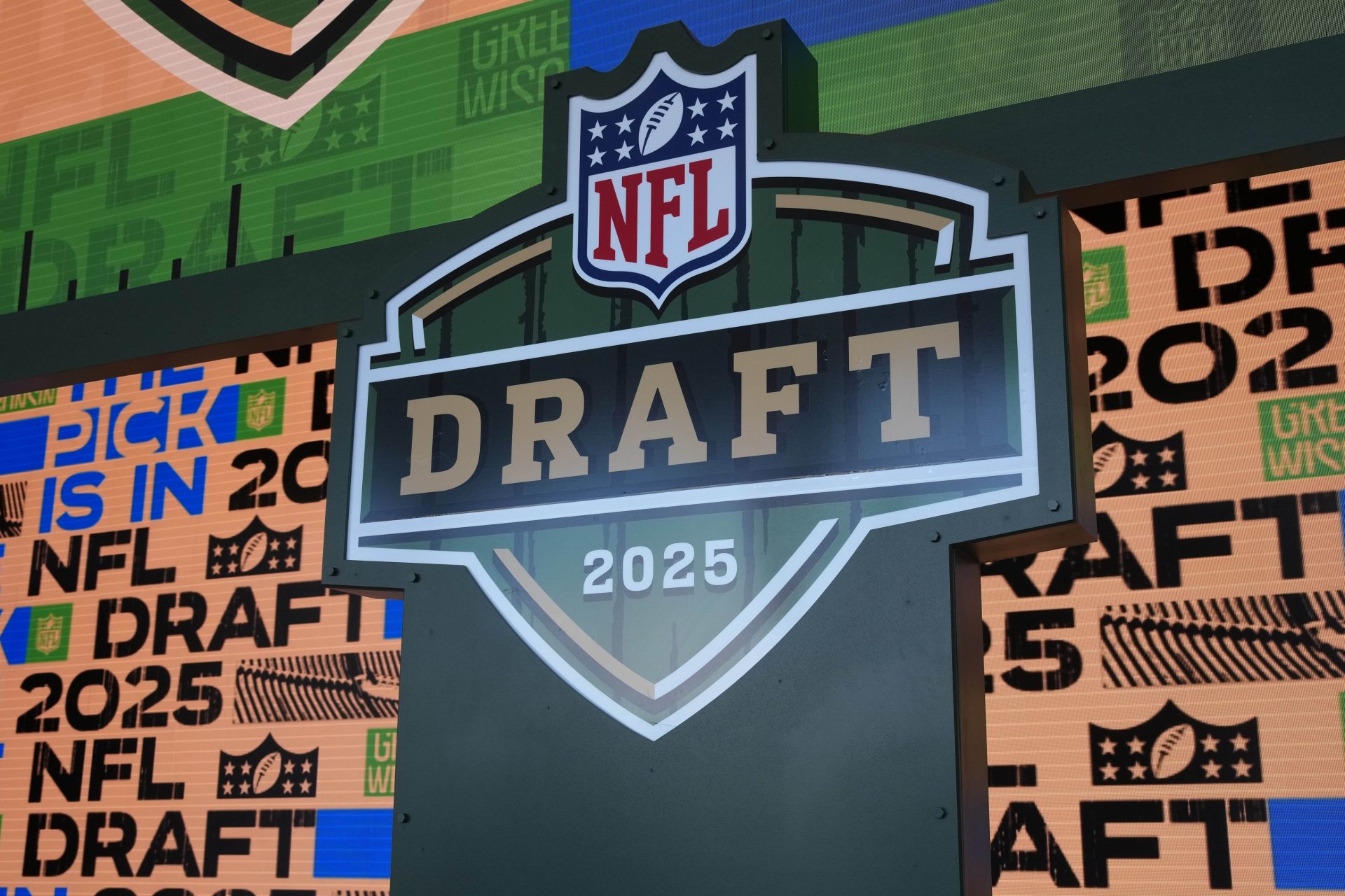 Apr 23, 2025; Green Bay, WI, USA; A general overall view of the 2025 NFL Draft logo on the Draft stage at Lambeau Field.