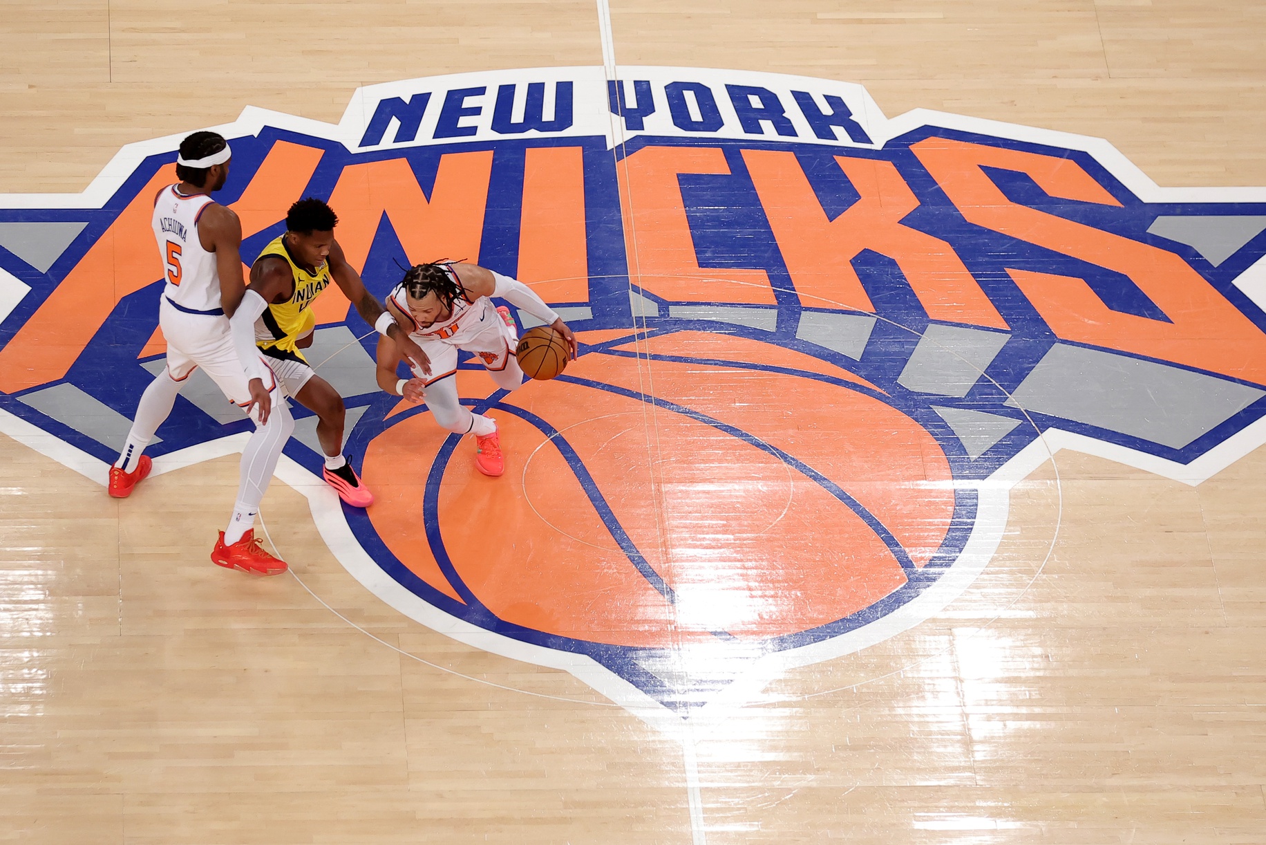 May 29, 2025; New York, New York, USA; New York Knicks forward Precious Achiuwa (5) sets a pick against Indiana Pacers guard Bennedict Mathurin (00) for Knicks guard Jalen Brunson (11) during the third quarter of game five of the eastern conference finals during the 2025 NBA Playoffs at Madison Square Garden.