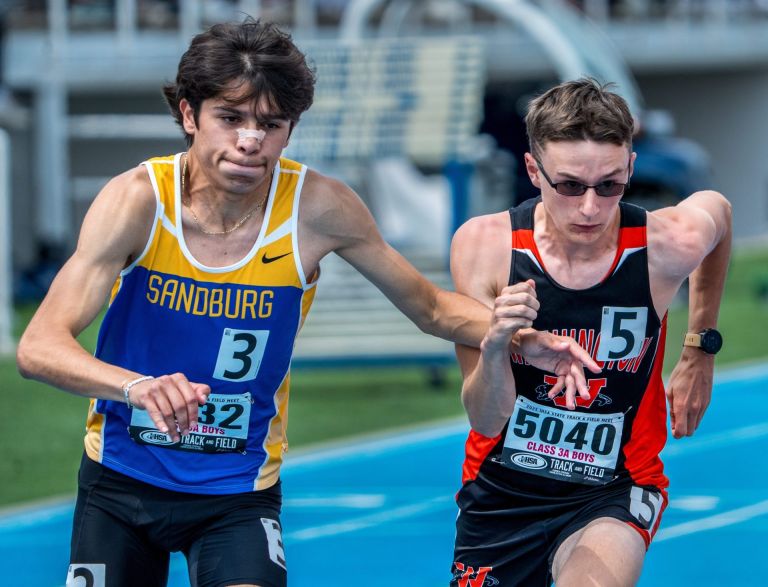 Washington's Ben Gorsage, right, and Orland Park Sandburg's Mateo Ramiro-Garcia tangle at the start of the Class 3A state 800-meter run Saturday, May 31, 2025 at Eastern Illinois University in Charleston. Gorsage took third place, followed by Ramiro-Garcia in fourth.