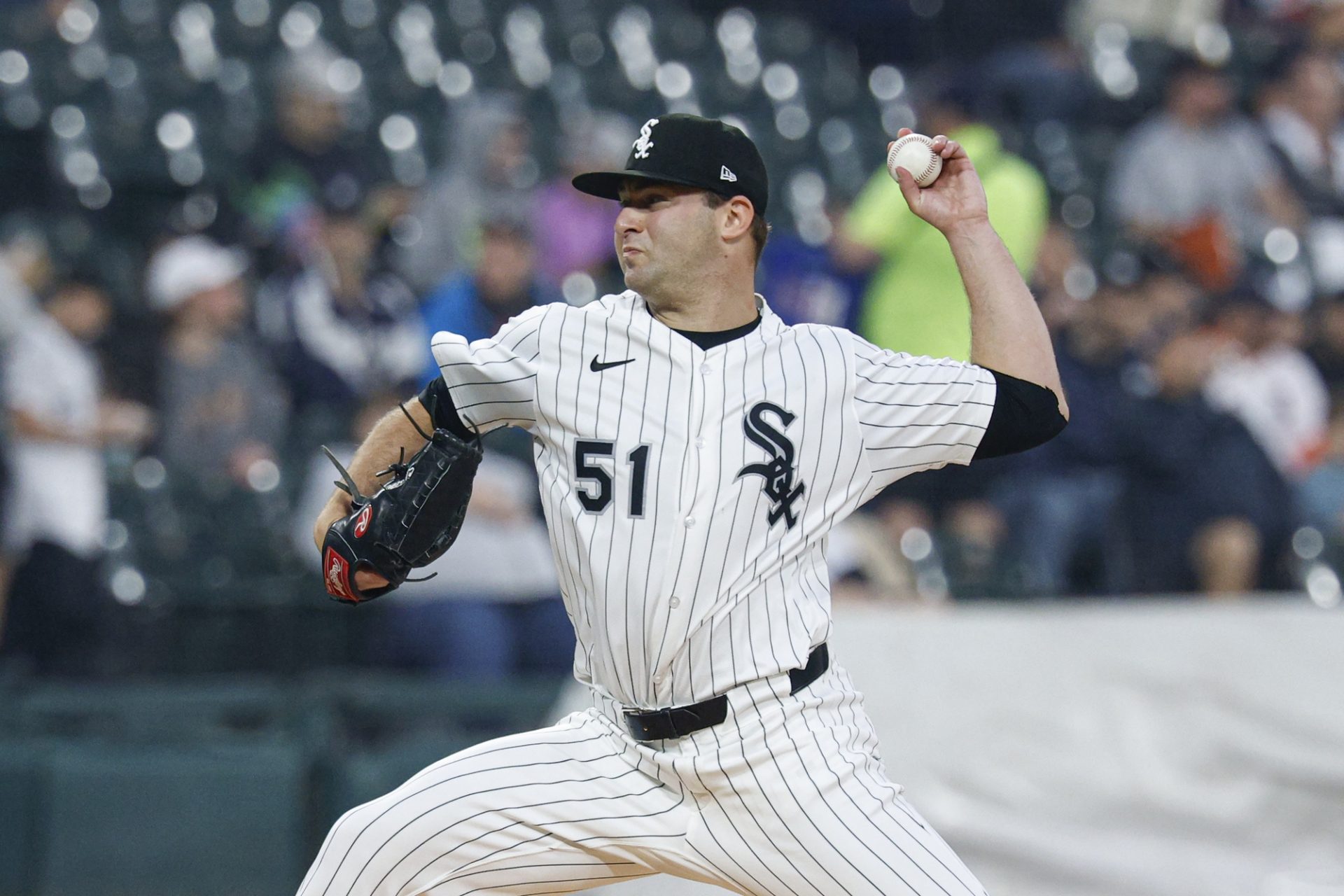 Jun 4, 2025; Chicago, Illinois, USA; Chicago White Sox starting pitcher Jared Shuster (51) delivers a pitch against the Detroit Tigers during the first inning at Rate Field.