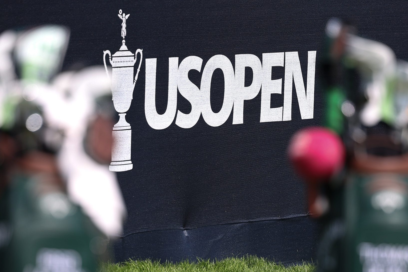 Jun 11, 2025; Oakmont, Pennsylvania, USA; General view of US Open signage on the 18th hole during a practice round for the U.S. Open golf tournament at Oakmont Country Club.