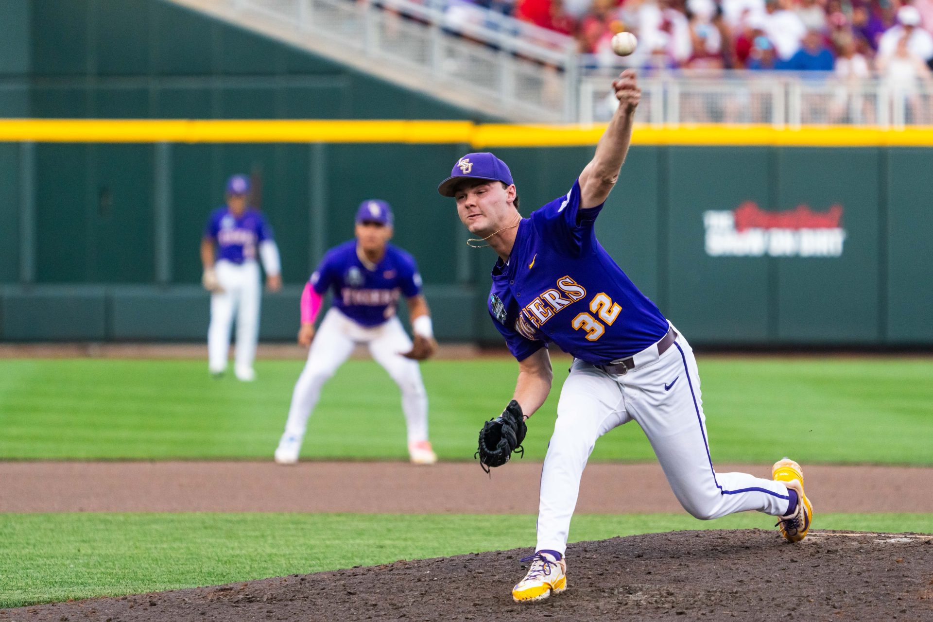 Jun 14, 2025; Omaha, Neb, USA; LSU Tigers starting pitcher Kade Anderson (32) pitches against the Arkansas Razorbacks during the seventh inning at Charles Schwab Field.