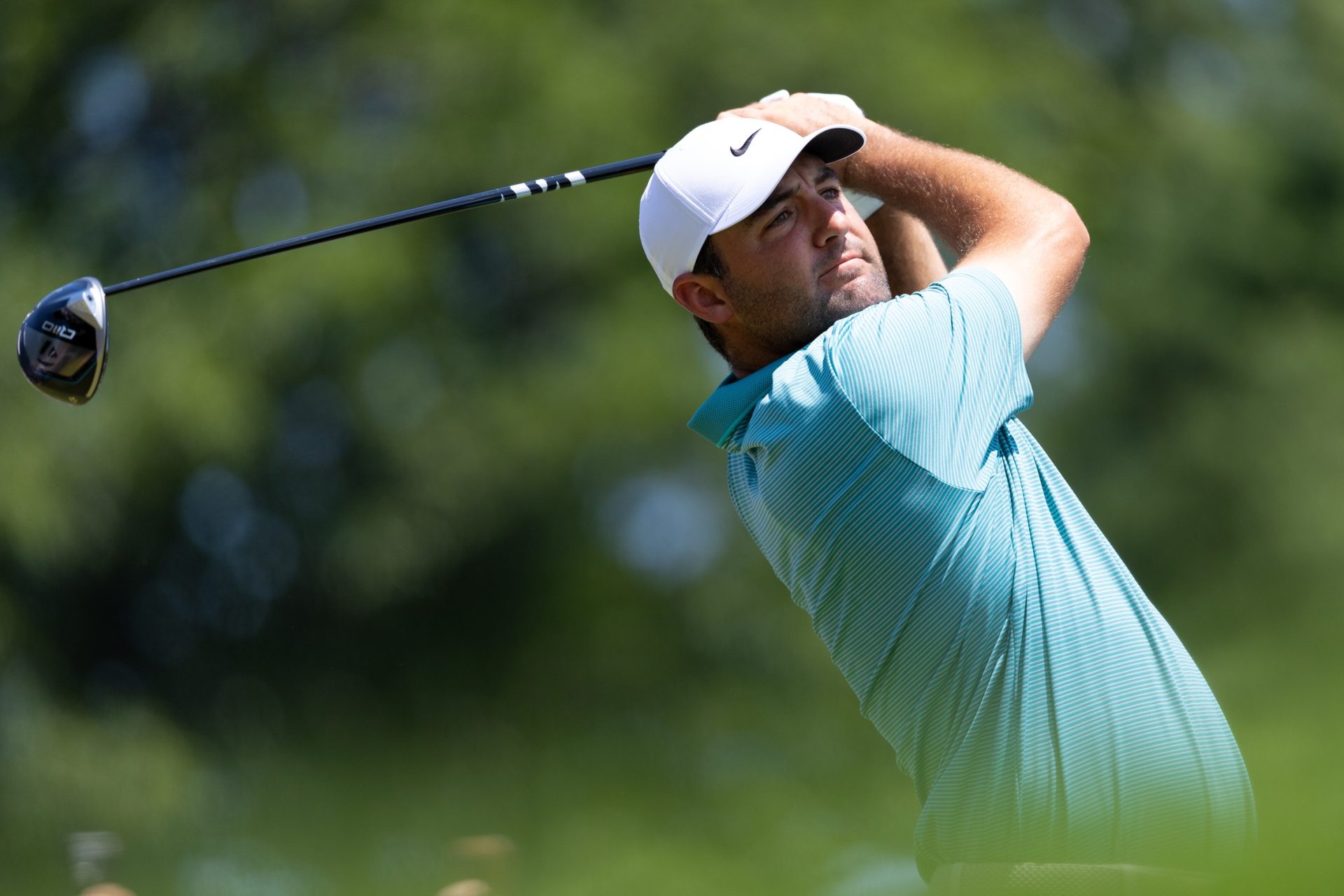 Jun 22, 2025; Cromwell, Connecticut, USA; Scottie Scheffler plays his shot from the first tee during the final round of the Travelers Championship golf tournament.