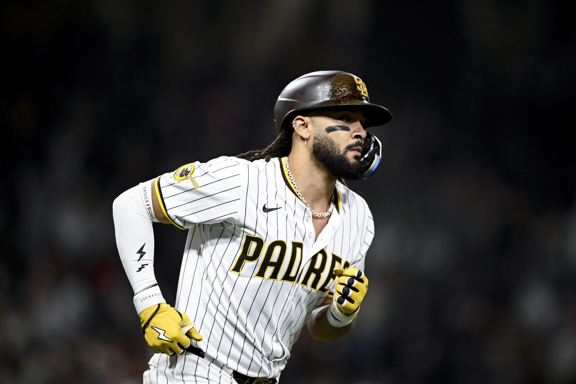 Jun 23, 2025; San Diego, California, USA; San Diego Padres right fielder Fernando Tatis Jr. (23) rounds the bases after hitting a solo home run during the ninth inning against the Washington Nationals at Petco Park.