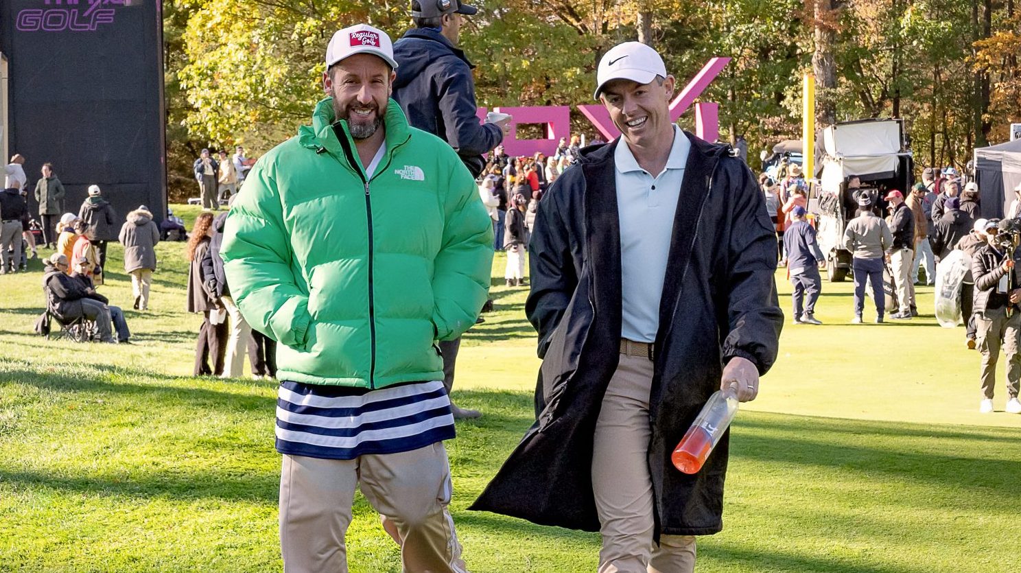 HAPPY GILMORE 2. BTS - (L to R) Adam Sandler as Happy Gilmore and Rory McIlroy as himself on the set of Happy Gilmore2.