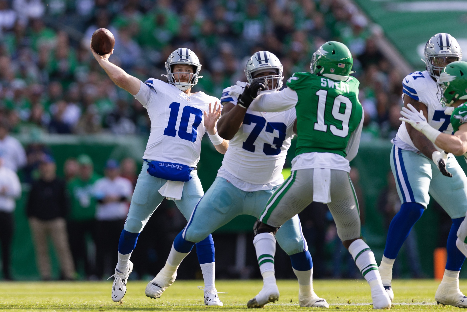 Dec 29, 2024; Philadelphia, Pennsylvania, USA; Dallas Cowboys quarterback Cooper Rush (10) passes the ball against the Philadelphia Eagles during the first quarter at Lincoln Financial Field.