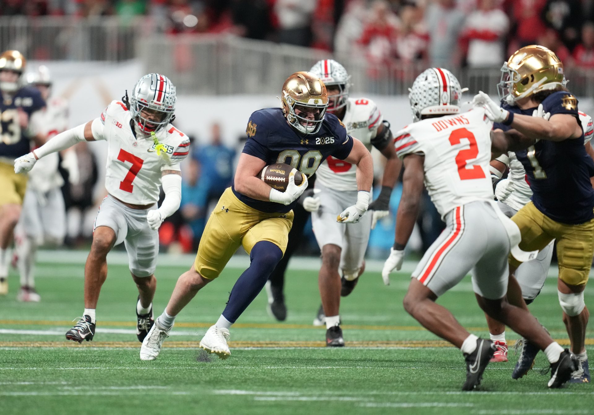 Jan 20, 2025; Atlanta, GA, USA; Notre Dame Fighting Irish tight end Mitchell Evans (88) runs the ball against the Ohio State Buckeyes in the second half in the CFP National Championship college football game at Mercedes-Benz Stadium.